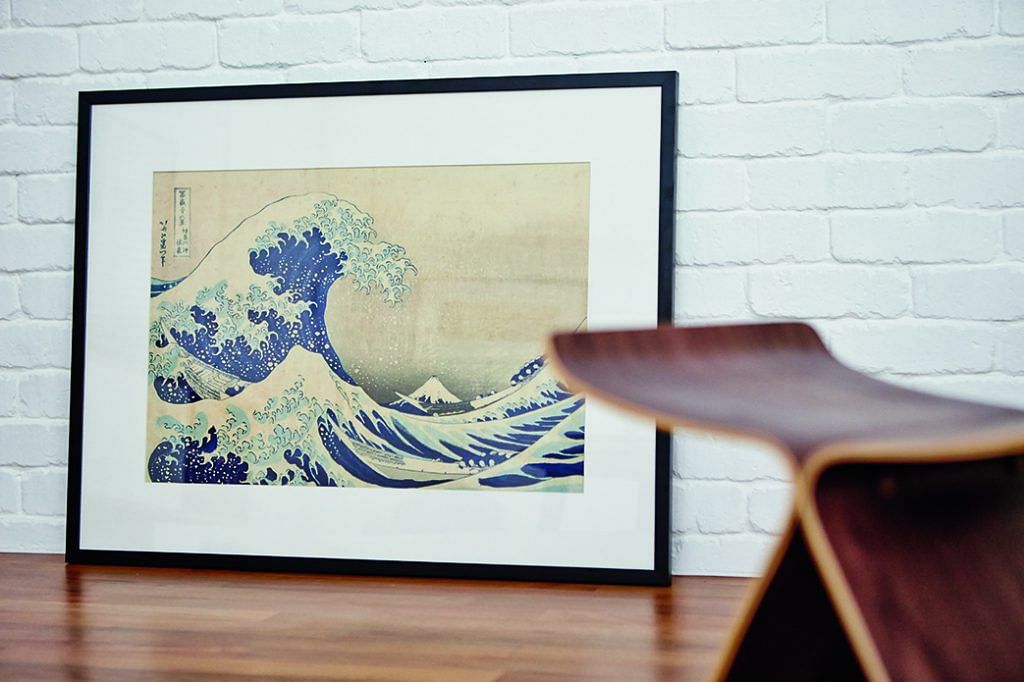 Homeowner of a 4-room HDB, Mr Lee took home this print of the The Great Wave Off Kanagawa, after his trip to the Rijksmuseum in Amsterdam. 