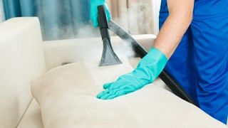 cleaning company providing chemical steam cleaning service with a professiona sofa steam cleaning equipment